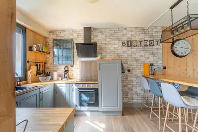 Cuisine ou kitchenette dans l'établissement Comme Un Petit Chalet