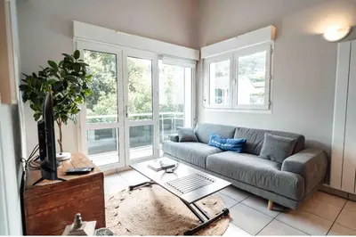 Coin salon dans l'établissement Cozy apartment by the sea