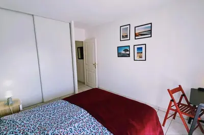 Un ou plusieurs lits dans un hébergement de l'établissement Spacious apartment in La Teste-de-Buch