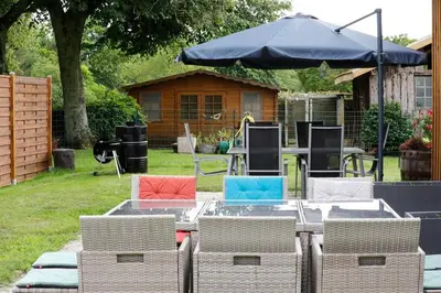 Jardin de l'établissement Maison familiale proche du lac