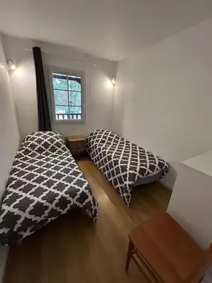Un ou plusieurs lits dans un hébergement de l'établissement Charmante maison dans résidence avec piscine proche golf et plage