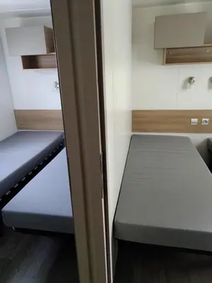 Un ou plusieurs lits dans un hébergement de l'établissement mobil home