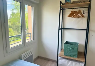 Un ou plusieurs lits dans un hébergement de l'établissement Chalet Paisible proche du Lac