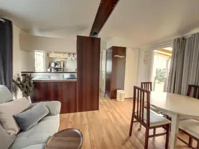 Coin salon dans l'établissement Mobilhome Cocooning