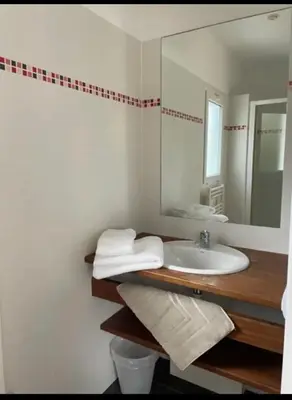 Salle de bains dans l'établissement Villa DUNE