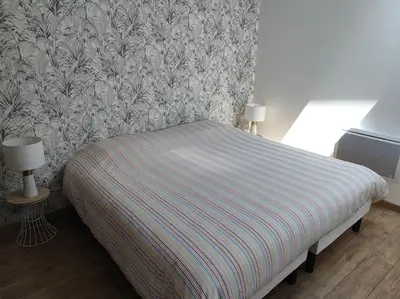 Un ou plusieurs lits dans un hébergement de l'établissement Maison moderne à Mimizan Idéale pour un séjour au calme