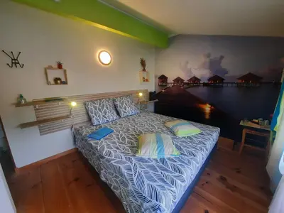 Un ou plusieurs lits dans un hébergement de l'établissement Chambre d'hôtes La Perla du Teich, piscine chauffée
