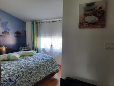 Un ou plusieurs lits dans un hébergement de l'établissement Chambre d'hôtes La Perla du Teich, piscine chauffée