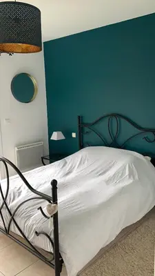 Un ou plusieurs lits dans un hébergement de l'établissement Maison proche Hossegor