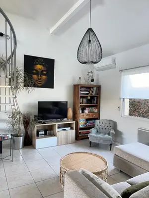 Télévision ou salle de divertissement dans l'établissement Maison proche Hossegor