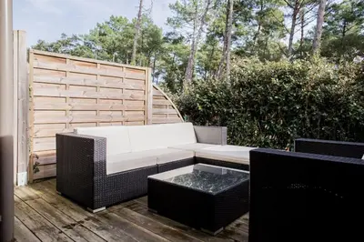Coin salon dans l'établissement Belle villa-patio à 700m de l'océan