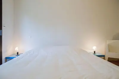 Un ou plusieurs lits dans un hébergement de l'établissement Belle villa-patio à 700m de l'océan
