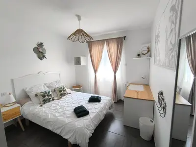 Un ou plusieurs lits dans un hébergement de l'établissement Location maison avec piscine pour 6 personnes