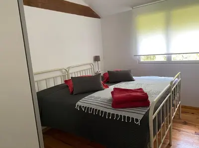 Un ou plusieurs lits dans un hébergement de l'établissement Magnifique grange de 90 m2