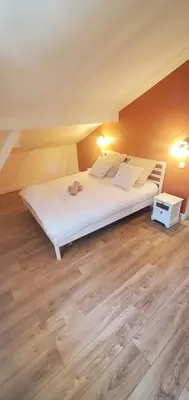 Un ou plusieurs lits dans un hébergement de l'établissement Magnifique Villa proche Golf & Centre d' Hossegor avec Jacuzzi