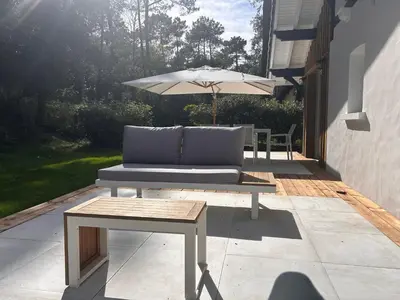 Coin salon dans l'établissement Magnifique Villa proche Golf & Centre d' Hossegor avec Jacuzzi