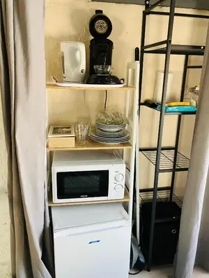 Cuisine ou kitchenette dans l'établissement Les chambres d'Ursule