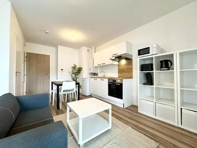 Cuisine ou kitchenette dans l'établissement L'Émeraude - Proche Hôpital - Parking - Clim - Fibre - Terrasse