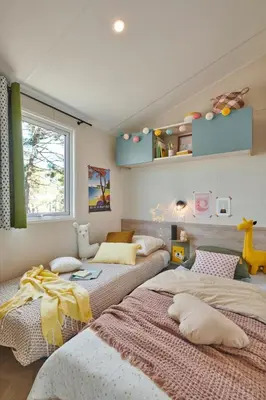 Un ou plusieurs lits dans un hébergement de l'établissement Camping maeva Respire La Comtesse