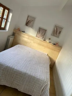 Un ou plusieurs lits dans un hébergement de l'établissement Chalet entre océan et foret au calme