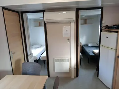 Un ou plusieurs lits dans un hébergement de l'établissement MOBIL HOME 6 Places - CLIMATISE