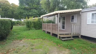 Jardin de l'établissement MOBIL HOME 6 Places - CLIMATISE