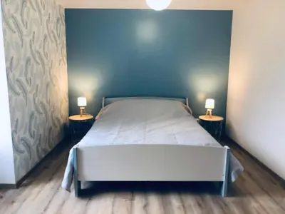 Un ou plusieurs lits dans un hébergement de l'établissement Gîte 2 à 5 personnes au coeur de la Nature