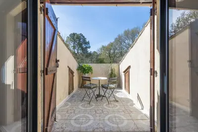 Balcon ou terrasse dans l'établissement Suite familiale 2 chambres communicantes et piscine