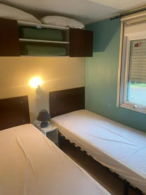 Un ou plusieurs lits dans un hébergement de l'établissement Mobilhome