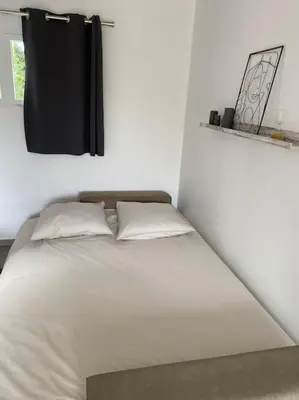 Un ou plusieurs lits dans un hébergement de l'établissement Maison calme IHESA