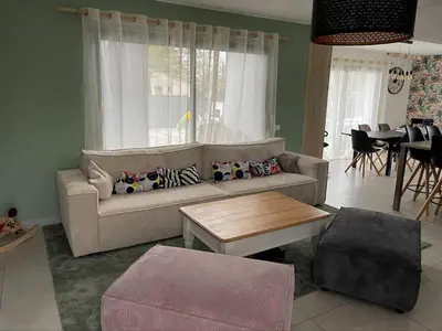 Coin salon dans l'établissement Magnifique villa avec piscine à 20 min de hossegor