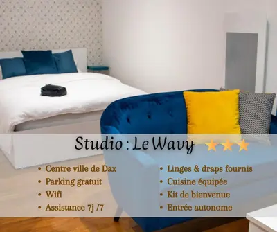 Un ou plusieurs lits dans un hébergement de l'établissement WAVY, studio centre ville DAX