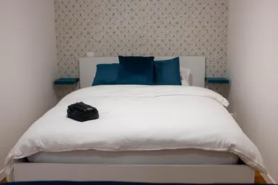 Un ou plusieurs lits dans un hébergement de l'établissement WAVY, studio centre ville DAX