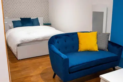 Un ou plusieurs lits dans un hébergement de l'établissement WAVY, studio centre ville DAX