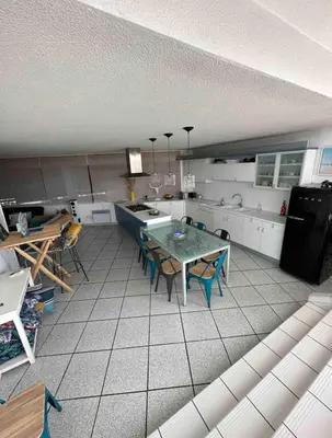 Cuisine ou kitchenette dans l'établissement Roof top piscine chauffée 7 pers wifi