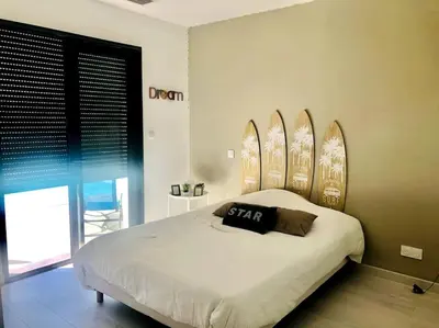 Un ou plusieurs lits dans un hébergement de l'établissement charmante maison pour des vacances idéales