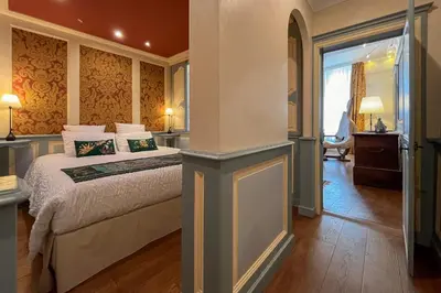 Un ou plusieurs lits dans un hébergement de l'établissement Chambre d'Art