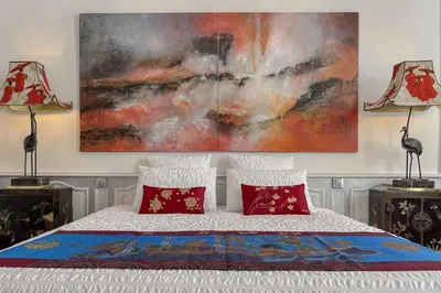 Un ou plusieurs lits dans un hébergement de l'établissement Chambre d'Art
