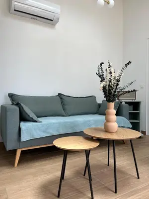 Coin salon dans l'établissement Maison avec piscine à SEIGNOSSE 8 personnes