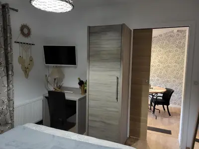Télévision ou salle de divertissement dans l'établissement Villa CAPAYAN