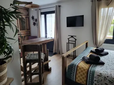 Télévision ou salle de divertissement dans l'établissement Villa CAPAYAN