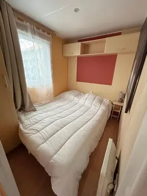 Un ou plusieurs lits dans un hébergement de l'établissement Mobil home camping Lalande Mimizan
