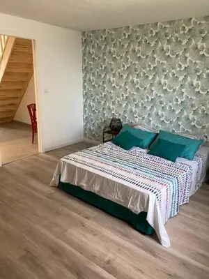Un ou plusieurs lits dans un hébergement de l'établissement Gîte de Broy