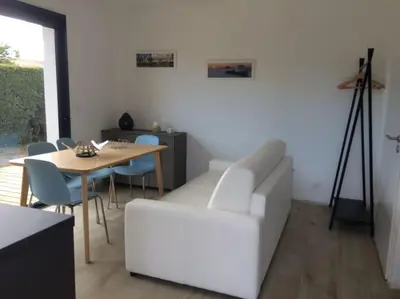 Coin salon dans l'établissement Joli studio de 25m2 avec terrasse, idéal pour un couple