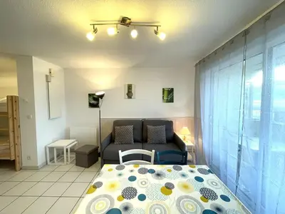 Un ou plusieurs lits dans un hébergement de l'établissement Studio confortable avec balcon et parking à Vieux-Boucau - FR-1-379-175