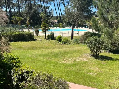 Piscine de l'établissement chalet T4 ondres piscine et tennis ou située à proximité