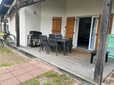 Balcon ou terrasse dans l'établissement chalet T4 ondres piscine et tennis