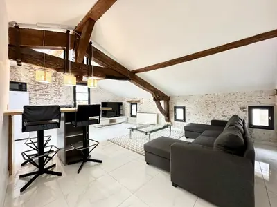 Coin salon dans l'établissement Les Remparts de Pitrac - Au Cœur de l'Hyper Centre