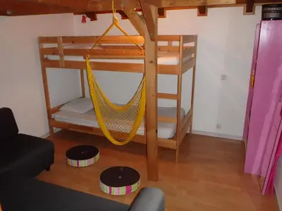 Un ou plusieurs lits superposés dans un hébergement de l'établissement Maison 120 M2, location saisonnière, proche de l'océan.