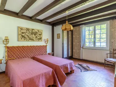 Un ou plusieurs lits dans un hébergement de l'établissement Maison à Parentis-en-Born: Piscine, 6 pers., Proche Lac et Océan, Pistes Cyclables - FR-1-319-553